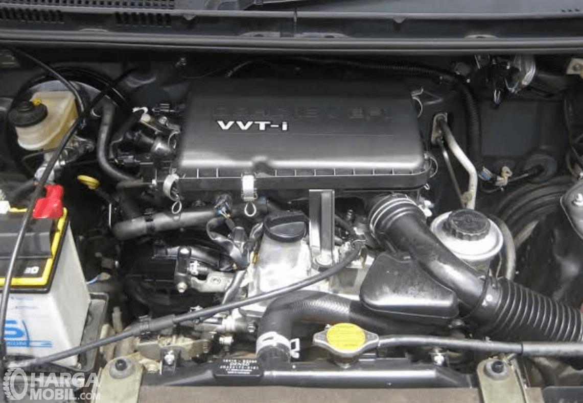 Gambar ini menunjukkan mesin VVT-i pada mobil Daihatsu Xenia 2011